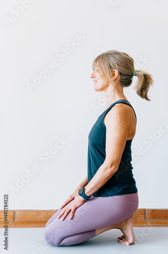 Woman seated on heels in broken toe yoga pose for post-run recovery