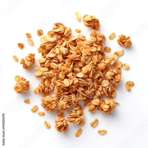 Pile of granola pieces scattered on white background