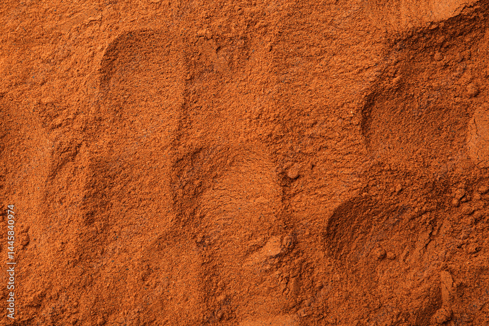Fototapeta premium Superfood. Cinnamon powder as background, top view