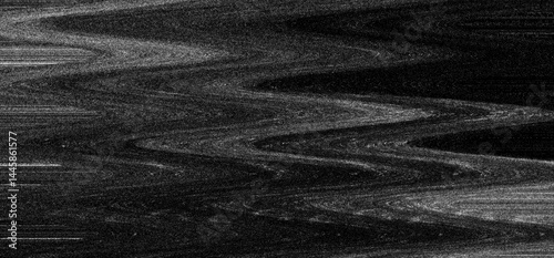 Film grain filter background with tv noise effect creating an abstract visual experience through textured patterns and monochrome tones.