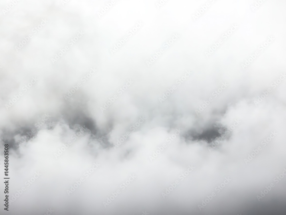 Fototapeta premium Dense white clouds form a misty atmospheric landscape with a soft light gradient creating a serene and abstract ambiance