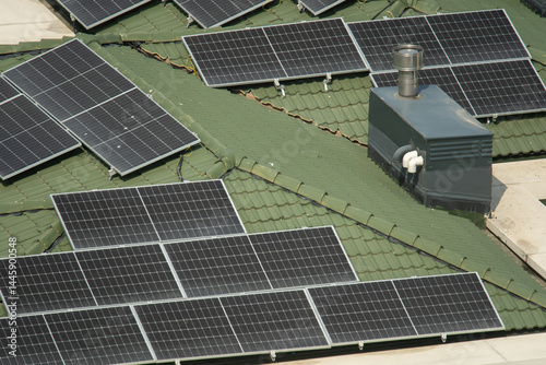 Solar panels on the roof of a suburban house