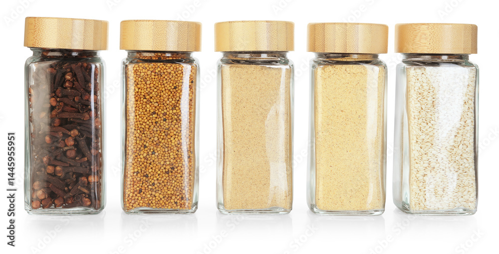 Many different aromatic spices in jars isolated on white Many different aromatic spices in jars isolated on white