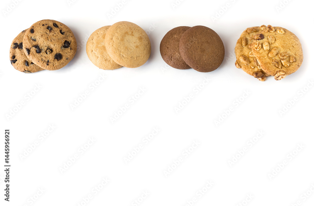 Set of different round cookies on white background with copy space, place for text.