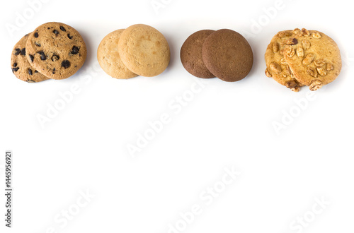 Obraz na płótnie Set of different round cookies on white background with copy space, place for text. w salonie