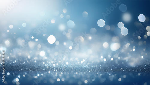 blur bookeh silver lights or flashes on a light blue color background