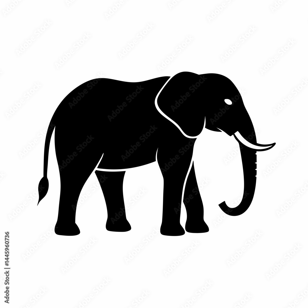 Silhouette of a black elephant with tusks and trunk raised Silhouette of a black elephant with tusks and trunk raised