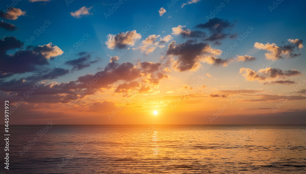 Fototapeta premium sunset sky vertical in the morning with blue and orange yellow sunrise and clouds fluffy horizon sea golden hour summer background