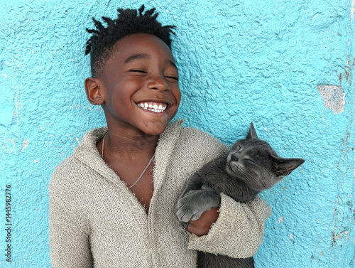 Happy Kid with Cat A joyful...