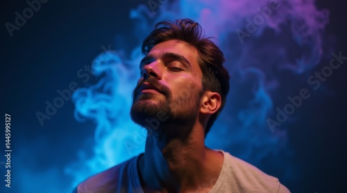 High-resolution stock photo of a serene male figure in his mid-30s with an introspective expression, eyes closed, and a subtle upwards tilt to his head, conveying a state of deep contemplation