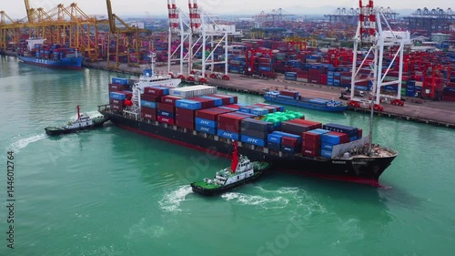Large cargo ship transporting colorful containers across ocean