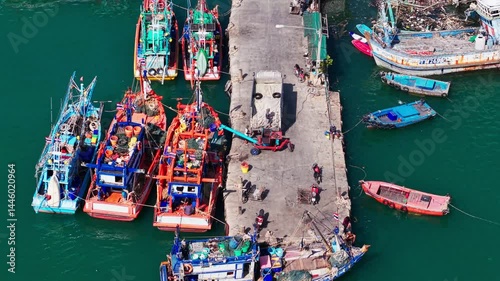 Large cargo ship transporting colorful containers across ocean