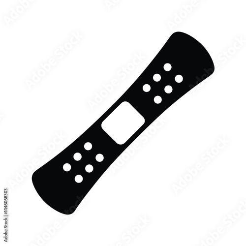 A black band aid with circular aeration holes used to cover wounds