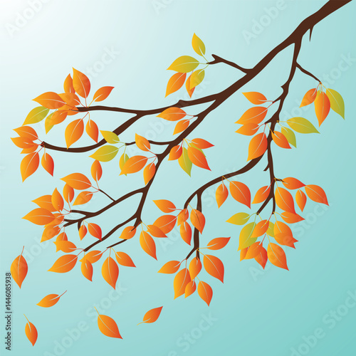 Autumn Branch with Orange and Yellow Leaves Against a Blue Sky