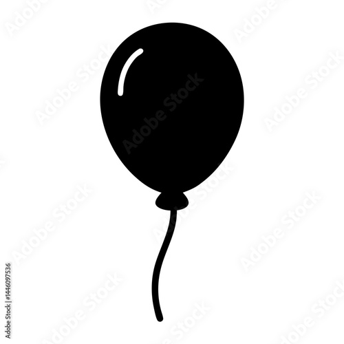 Single black balloon floating upwards with long string on white backdrop