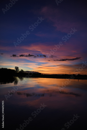 spectacularly and colorful sunset at Yellow Waters Billabong, Kakadu National Park, Northern Territory, Australia