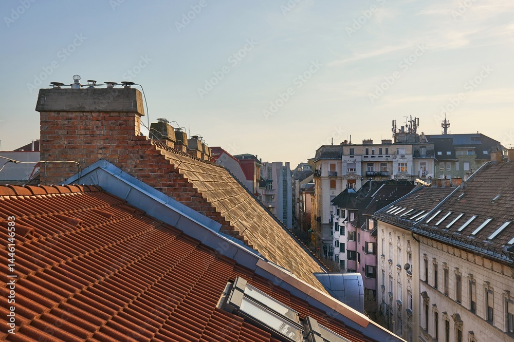 Tiled Building Roofs Over a City Street