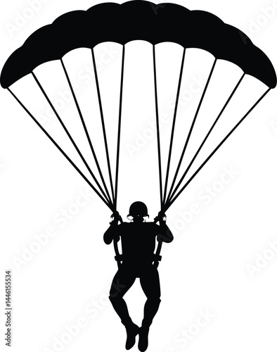 silhouette of a parachutist descending 