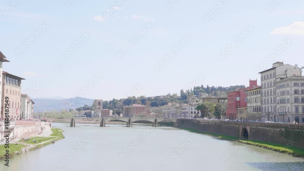Slow reveal of Ponte Alle Grazie Bridge and Arno River from Ponte Vecchio in Florence, Italy Slow reveal of Ponte Alle Grazie Bridge and Arno River from Ponte Vecchio in Florence, Italy