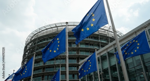 Wallpaper Mural European Union Parliament Building Flags - European Union flags waving in front of the parliament building on a cloudy day Torontodigital.ca