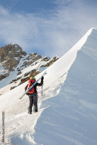 Adventure of ski touring on a scenic mountain ridge