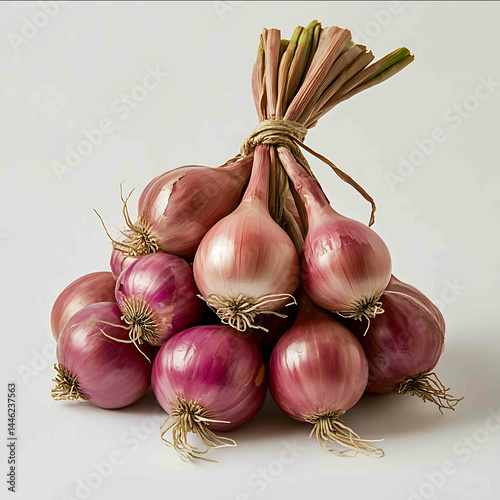 a photographic image of a bunch of spanish onions on a white backg photo