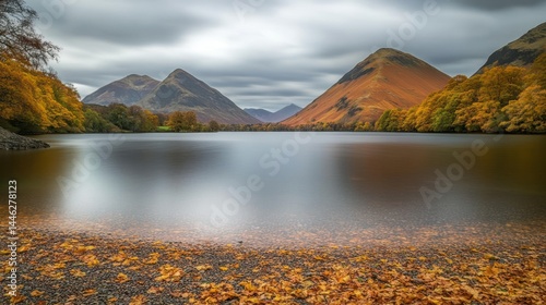 Buttermere lake in the lake district under an overcast sky