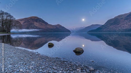 Obraz na płótnie Tranquil lake reflects mountains and moon under a twilight sky w salonie