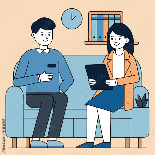 Smiling man consults an Asian female professional while sitting together on an apartment couch