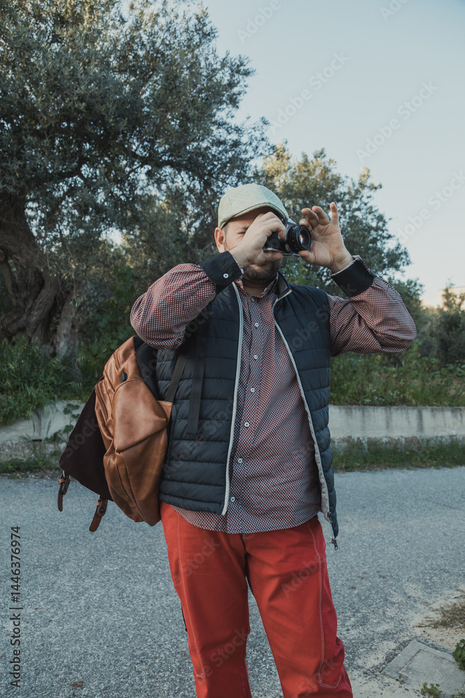 Photographer Taking Picture To The Trees At The Park