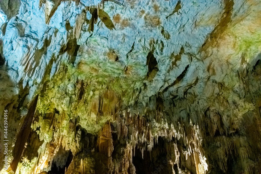 Exploring beautiful Postojna cave in Slovenia the most visited european cave. Thousands of stalagmites and stalactites