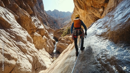 Canyon Adventure: Climber Navigating Rocky Terrain
