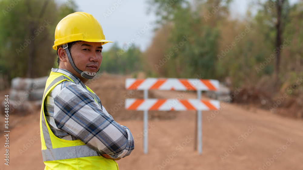 Road Construction Observer: A dedicated road construction worker stands with watchful gaze, embodying the essence of safety and expertise amidst the ongoing construction project.
