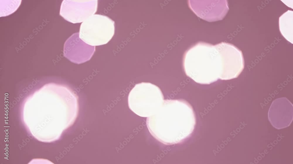 Soft pink bokeh lights creating a dreamy background  