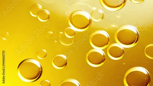 This captivating video showcases a processed collage of golden yellow oil bubbles, creating a rich and textured background ideal for use in banners and advertisements.