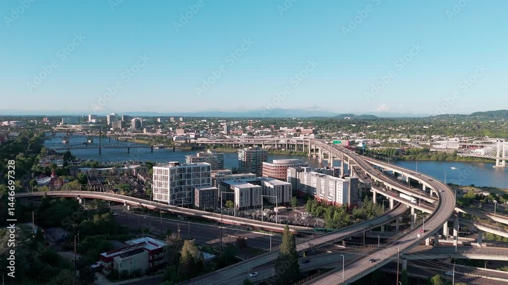 Aerial approach towards the Willamette River over I-26 and I-5 freeways in downtown Portland Oregon Aerial approach towards the Willamette River over I-26 and I-5 freeways in downtown Portland Oregon