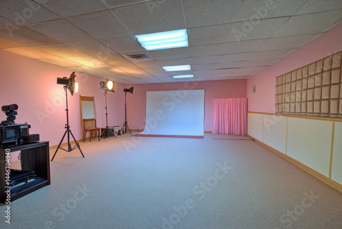 Interior studio photography reveals clean space and backdrop. scene conveys serenity and readiness for creative session