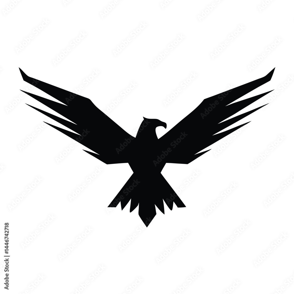 Fototapeta premium Silhouette of an eagle flying with spread wings on a white background