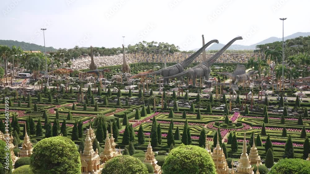 Dinosaur statues and botanical garden in Nong Nooch Tropical Botanical Garden, Pattaya, Thailand