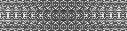 Elegant floral seamless pattern with intricate symmetrical designs. Perfect for wallpaper, fabric, textile, wrapping, background, or decorative use in digital and print projects.