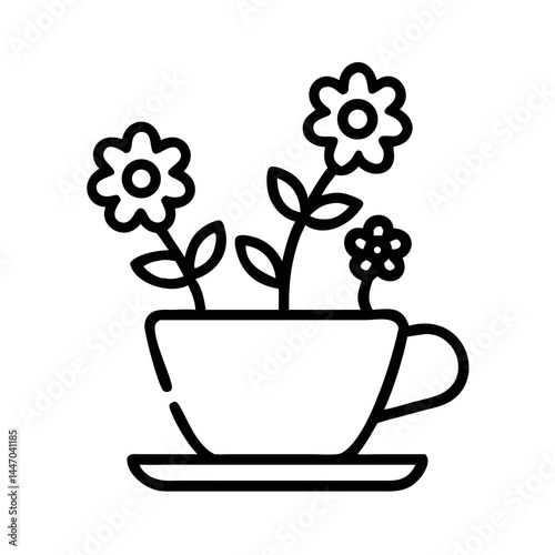 Flowering plants in a teacup planter design  