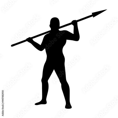 Silhouette of muscular man holding a spear above his shoulders standing powerfully