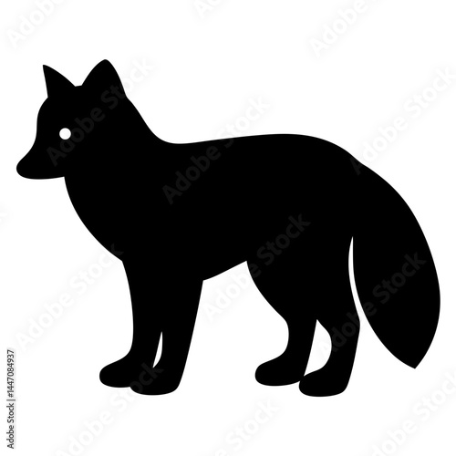 A striking black silhouette of a fox standing alert and poised