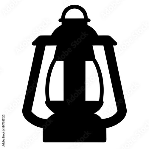 Silhouette of a vintage kerosene lantern, a beacon of past light