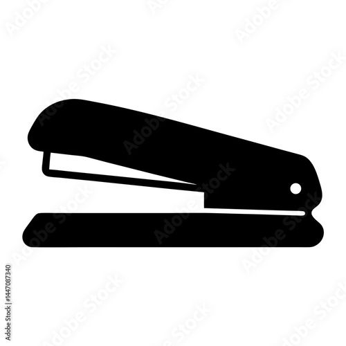 A simple black silhouette of a stapler for office or school use