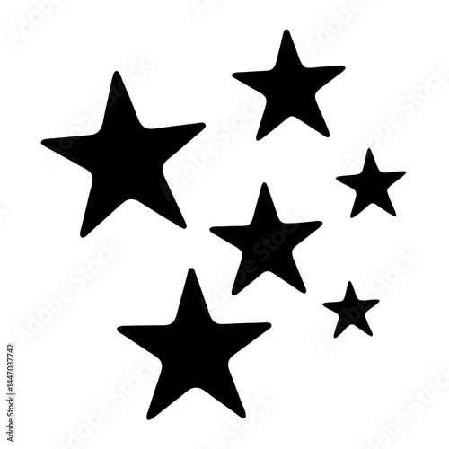 Group of six black stars of varying sizes on white background