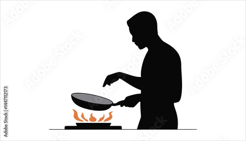 Silhouette of a Man Cooking with Frying Pan and Flames