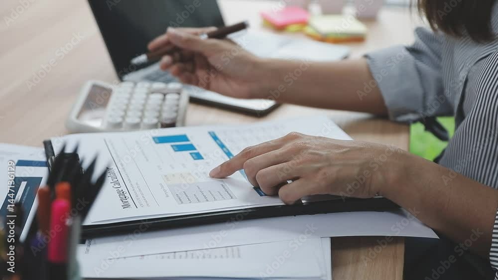 Accounting company provide finance and taxation planning for profitable cash flow, Auditor and accountant team working in office, analyze financial data and accounting record with calculator.Insight Accounting company provide finance and taxation planning for profitable cash flow, Auditor and accountant team working in office, analyze financial data and accounting record with calculator.Insight