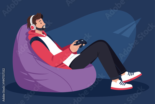 A relaxed man comfortably reclined in a plush bean bag chair, engrossed in a captivating video game on a handheld console.