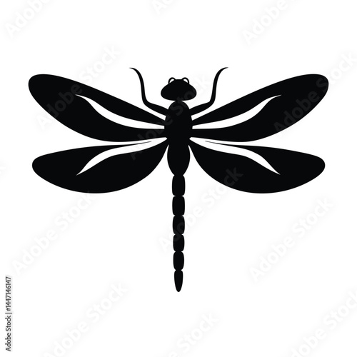 Silhouette of a dragonfly with its wings spread wide on a white background
